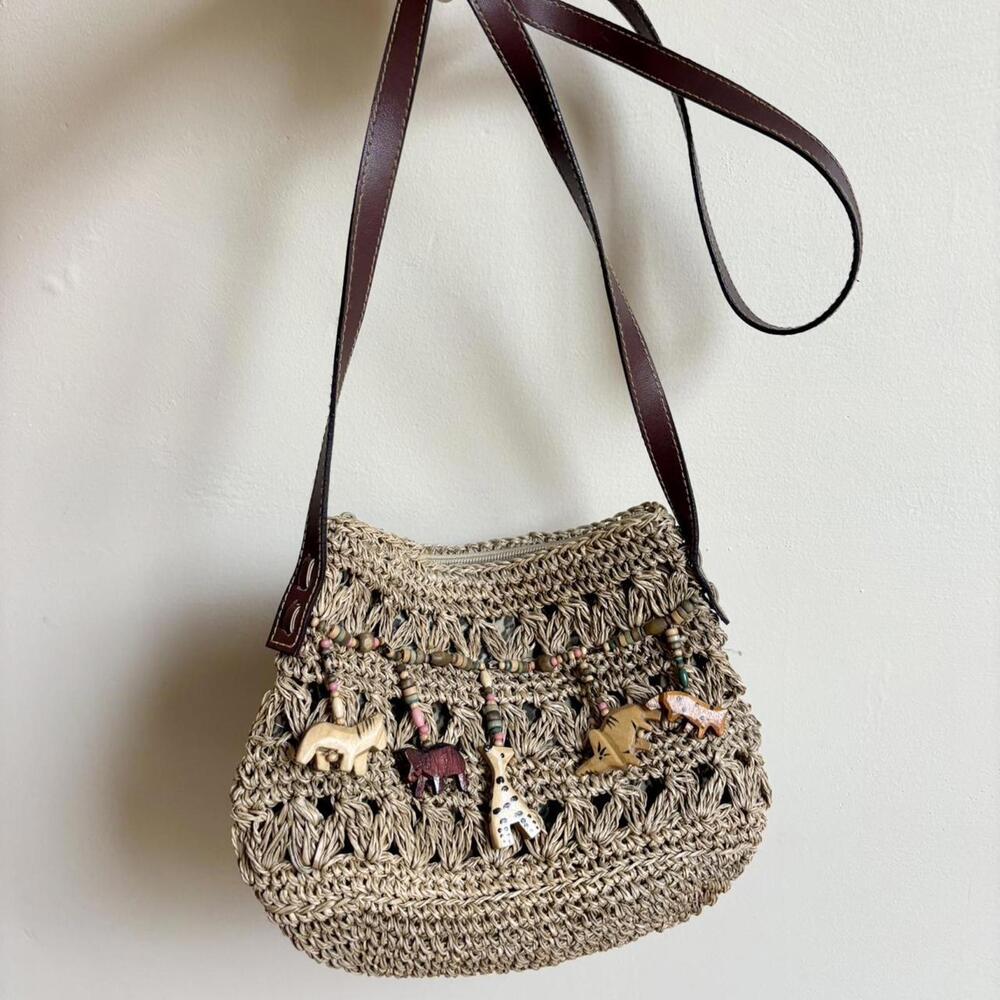 Brown straw style shoulder bag with beaded animals
